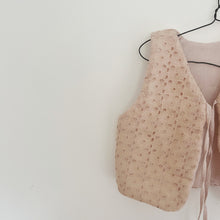 Load image into Gallery viewer, Beige quilted vest on a hanger against a white background